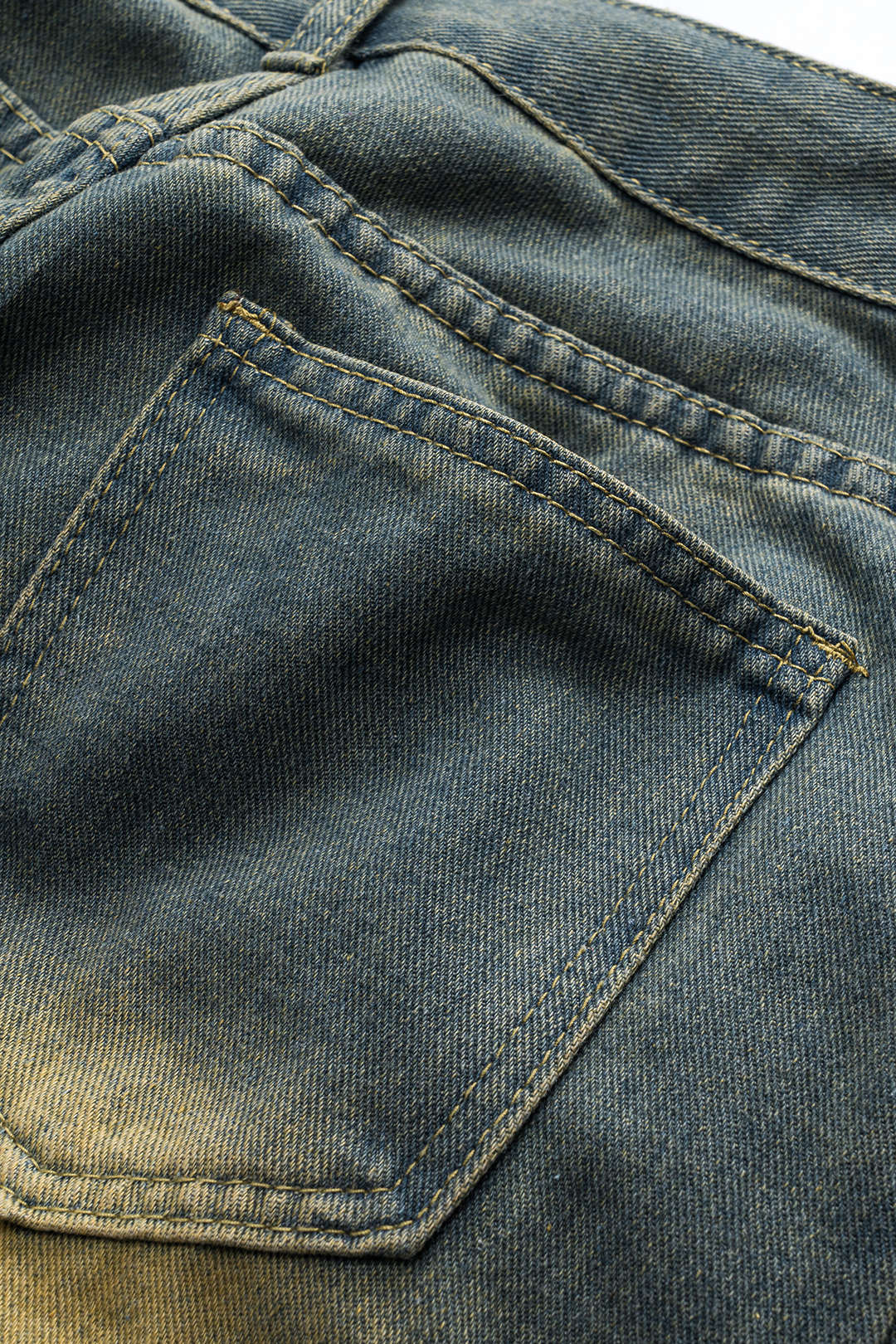 Püsküllü Cepli Düğmeli Bol Paça Denim Pantolon